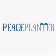 PEACE PLANTER WITH STYLIZED...
