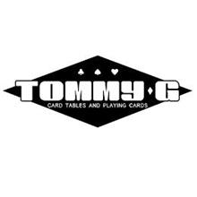 THE WORD TOMMY G IN A DIAMOND, A CLUB, A SPADE AND HEART SYMBOLS ABOVE THE TOMMY G, AND A DIAMOND SYMBOL BETWWEN TOMMY AND G E TPMMY G AND THE WORDS CARD TABLES AND PLAYING CARDS BELOW TOMMY G IN SMALLER FONT ALSO INTHE DIAMOND